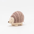 A horned mouse being hugged