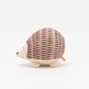 A horned mouse being hugged