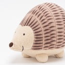 A horned mouse being hugged