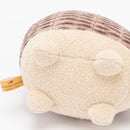 A horned mouse being hugged