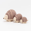 A horned mouse being hugged