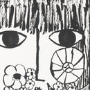 BEHIND FLOWERS